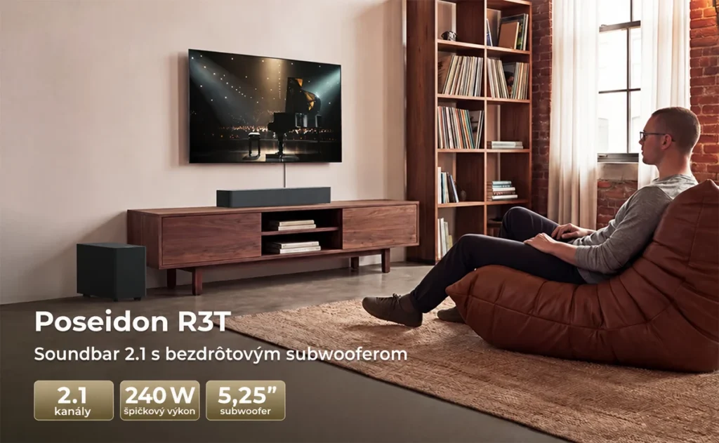 Soundbar ULTIMEA pod televízorom a samostatný subwoofer vedľa televíznej skrinky.